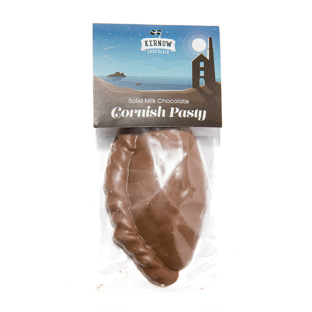 a packaged chocolate cornish pasty on a white background.